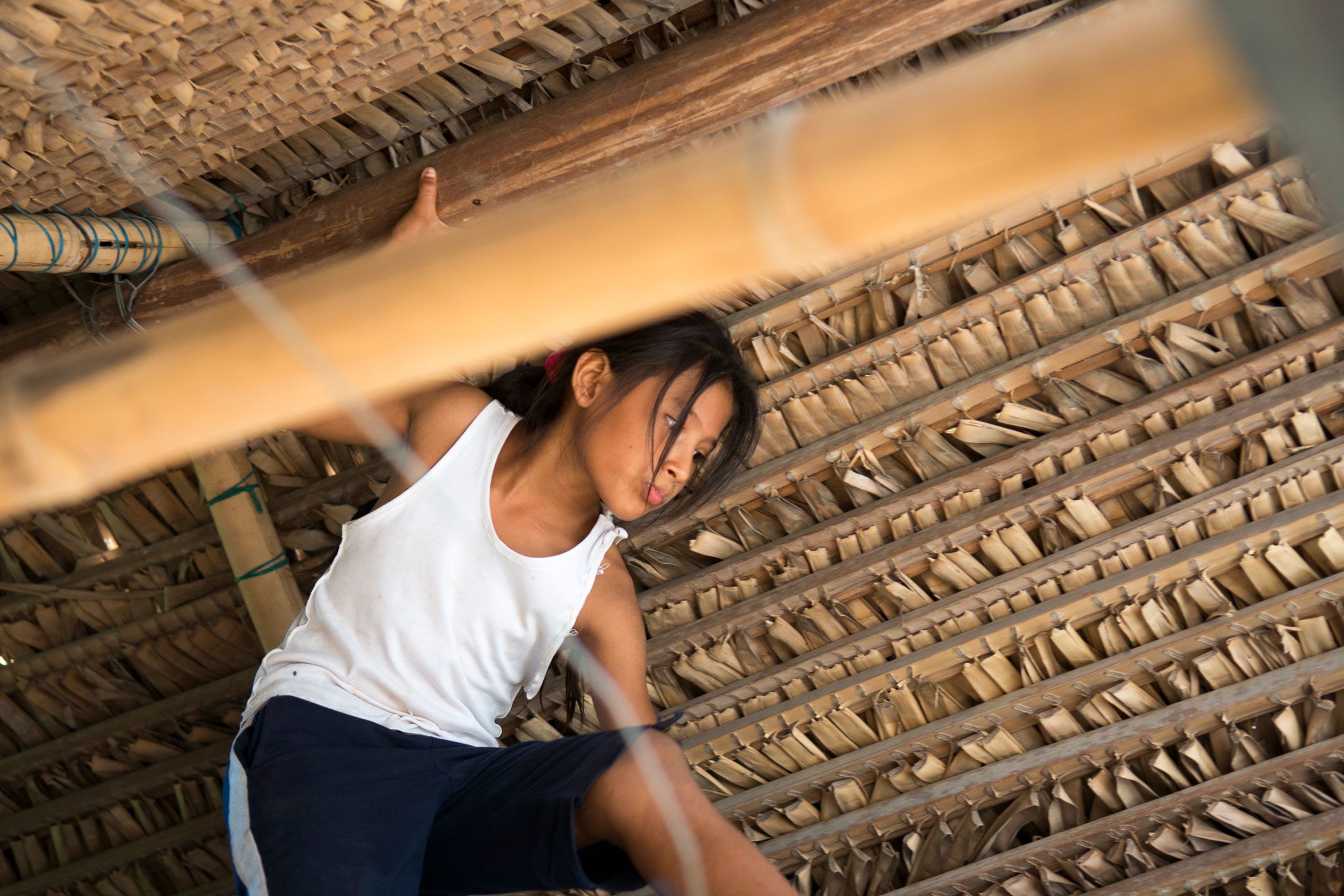 Little girl climbing in a house