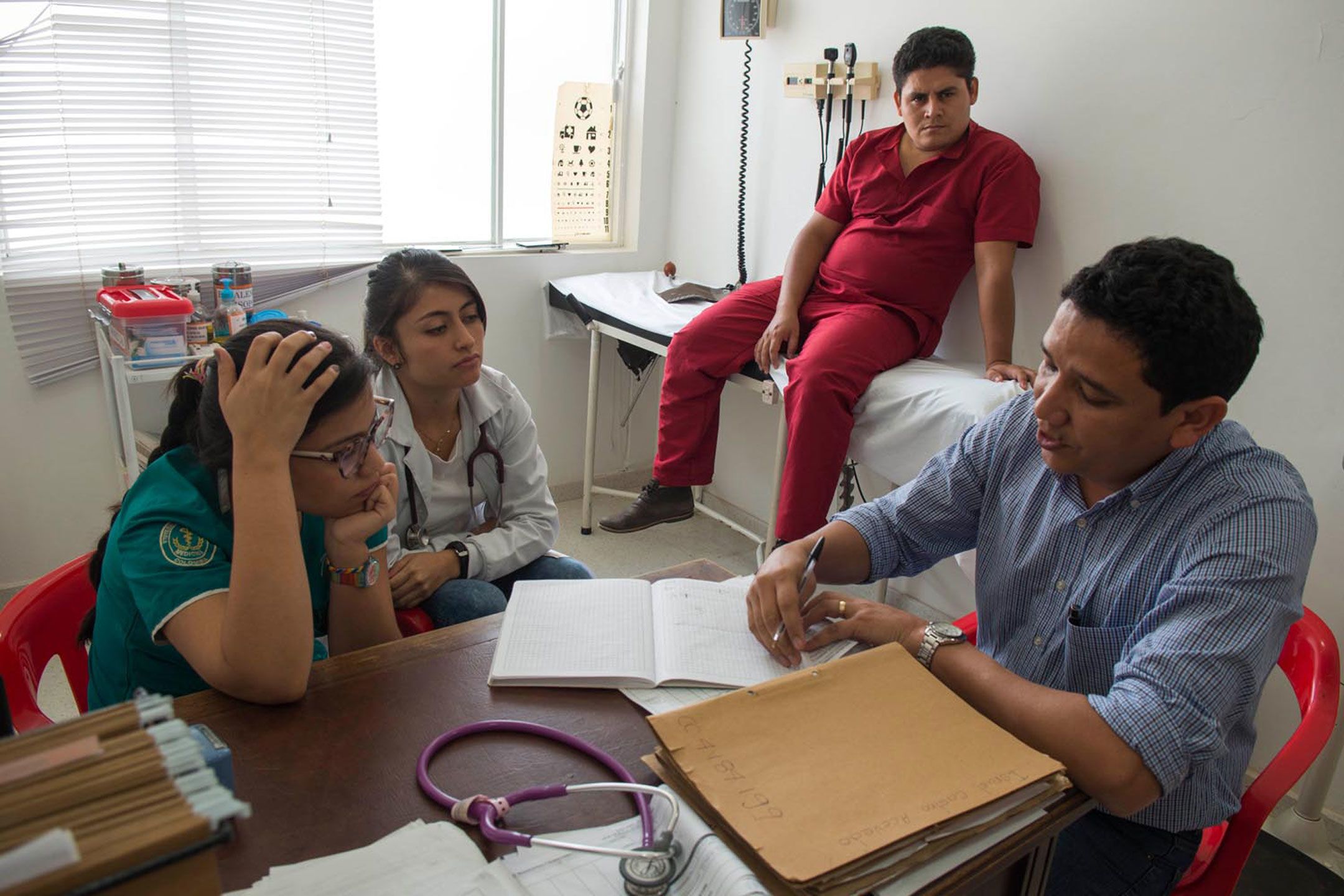 Health care professionals discussing