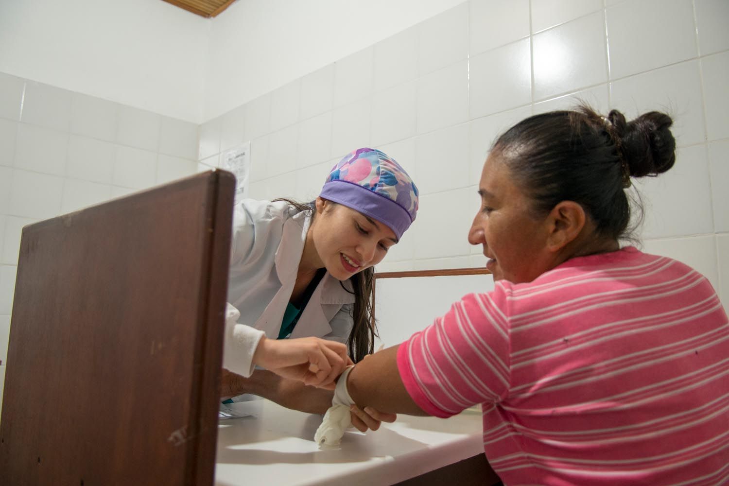 Nurse examining a woman
