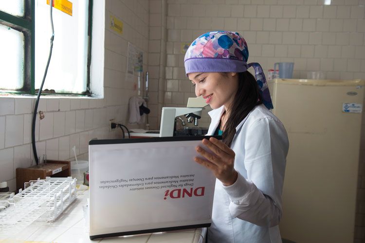 Woman looking in a file in a health care center