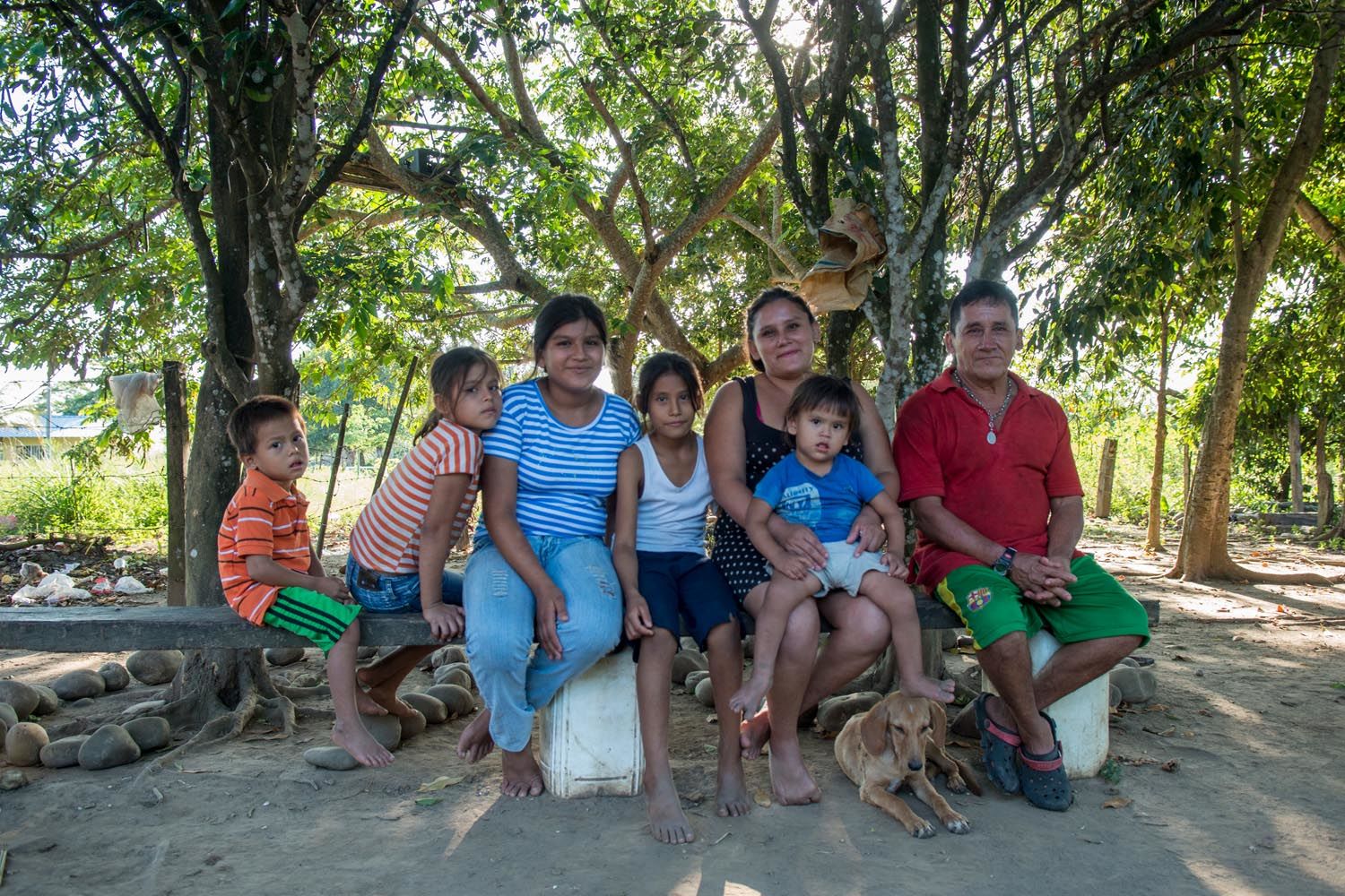 Family sitting on a bench